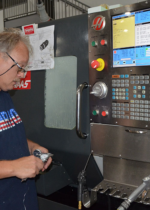 Taco worker working on project